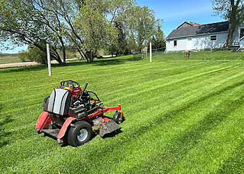 Whitby lawn care service Snowmen Property Services Inc.