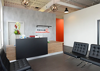 Stephanie Melanson, PT - REHAB1 PERFORMANCE CENTER MONCTON - Moncton, NB Physiothérapie - Clinic Interior Image
