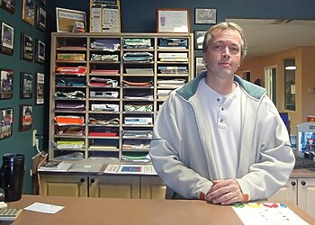 Ajax Imprimeries The Print Place