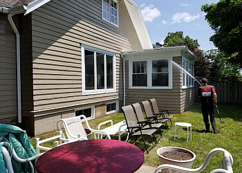 Windsor window cleaner Thunder Spray Inc.