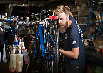 Village Bikes - Richmond, BC Bicycle Shops - Mechanic at Work Image