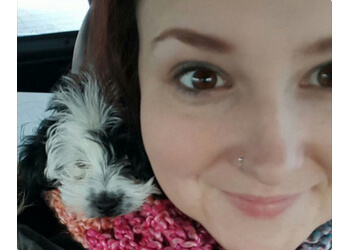 Calgary dog walker While Away House Sitters and Pet Care Inc.