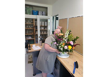 Red Deer Fleuristes la Petite Jaune Fleur